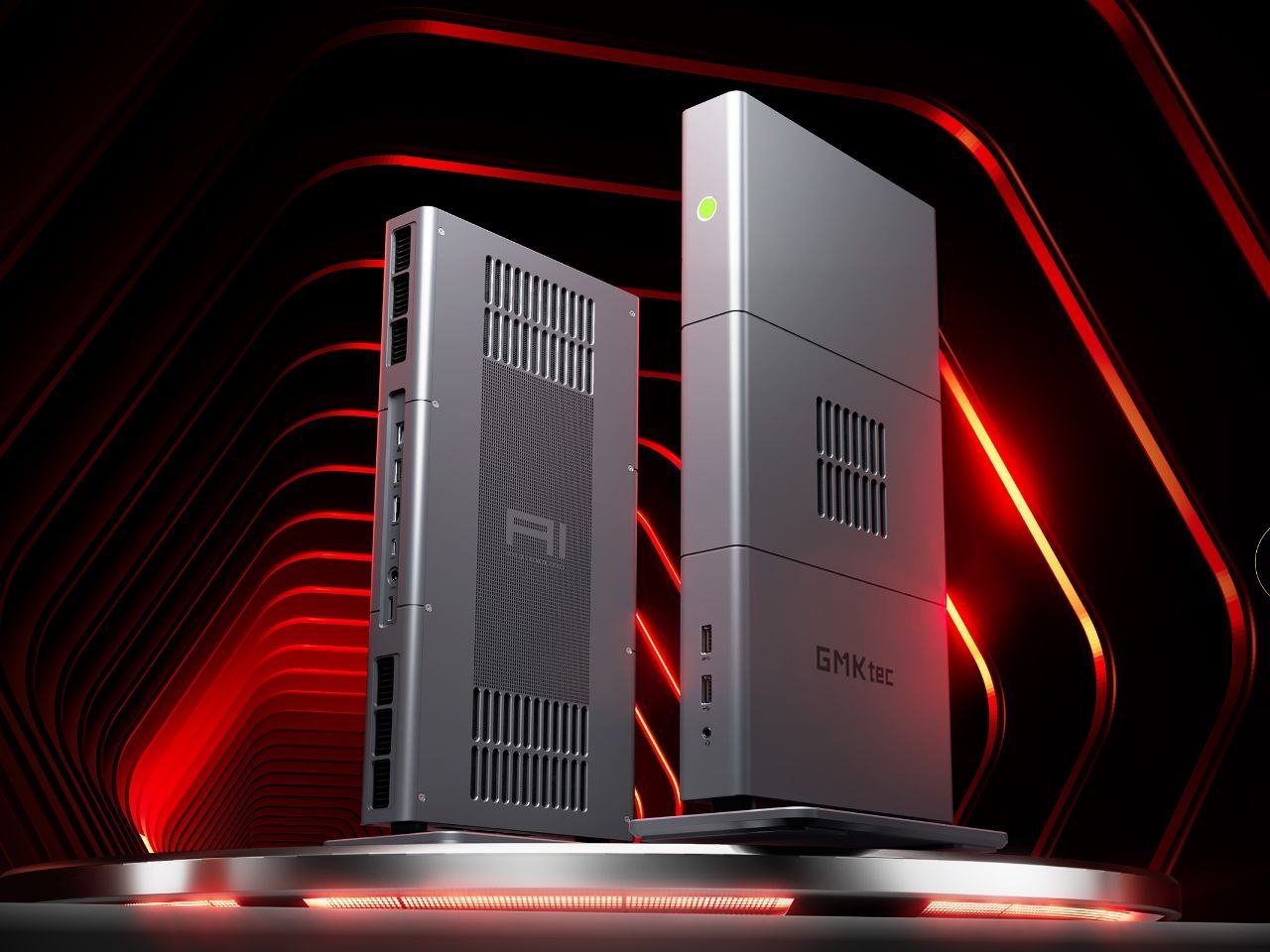 The two EVO-X3s as the catalogue sees them — Ryzen AI MAX+ 395, 128 GB LPDDR5X-8000, one of them standing in for the lab. (Product render: GMKtec.)